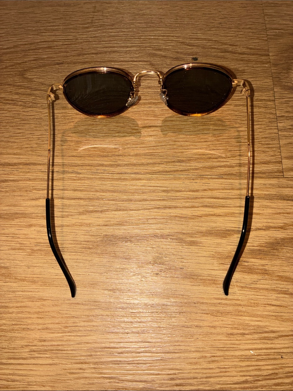 Oval Tortoiseshell Sunglasses with Gold Metal Arms